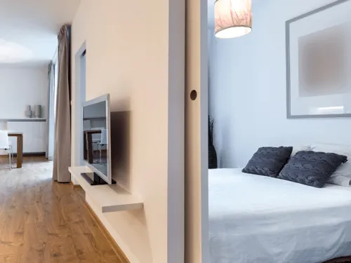 Spotless empty bedroom and living area after an end of tenancy deep clean